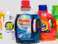 A row of liquid laundry detergents