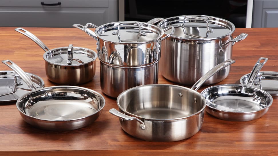 12-piece Cuisinart stainless steel cookware set on a wooden surface