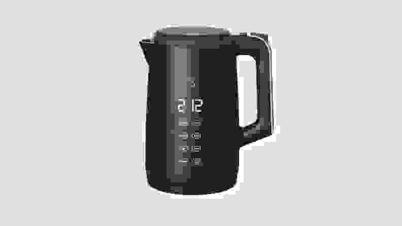 Product shot of black electric tea kettle from the Beautiful by Drew Barrymore Kitchen Appliances line.