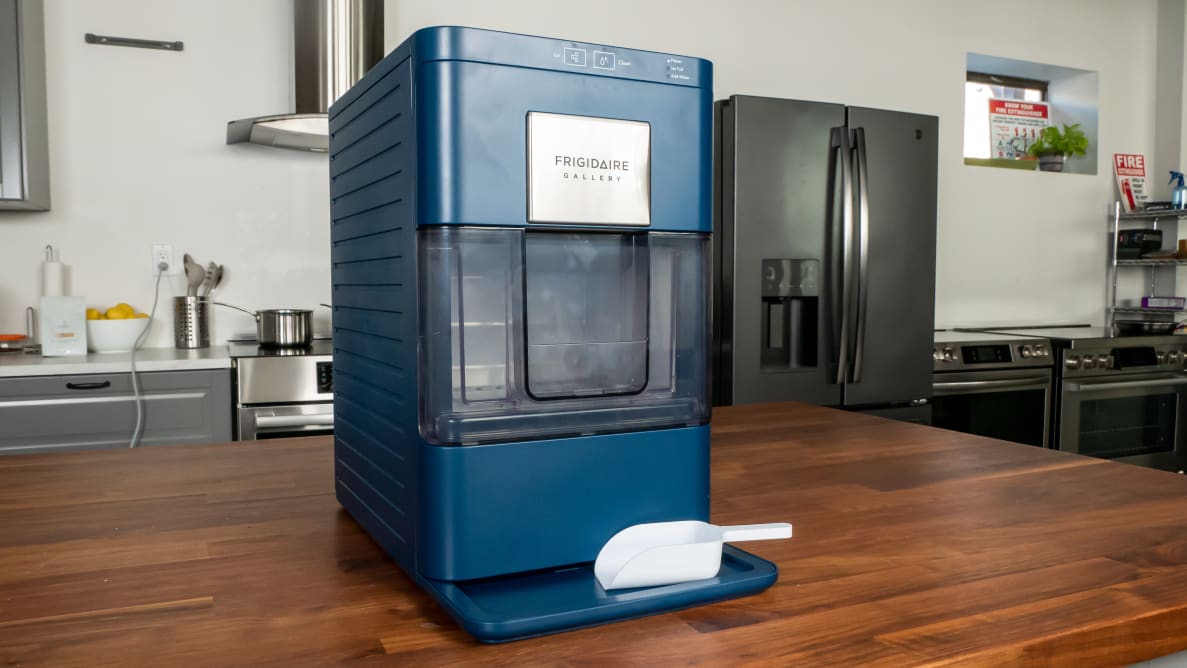 The Frigidaire Gallery EFIC255 nugget ice maker on a wooden counter.