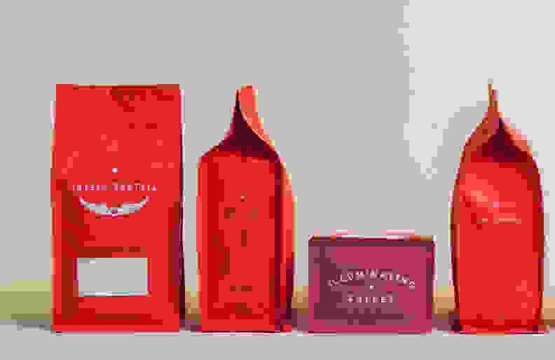 Four Intelligentsia bags of coffee laid out beside each other