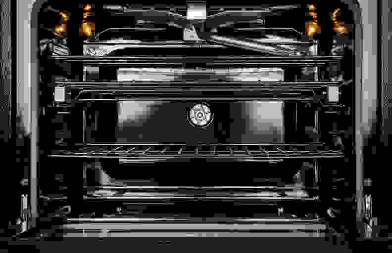 Looking inside of an open oven.