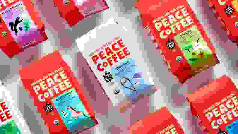 Several packets of peace coffee laid out on a white background