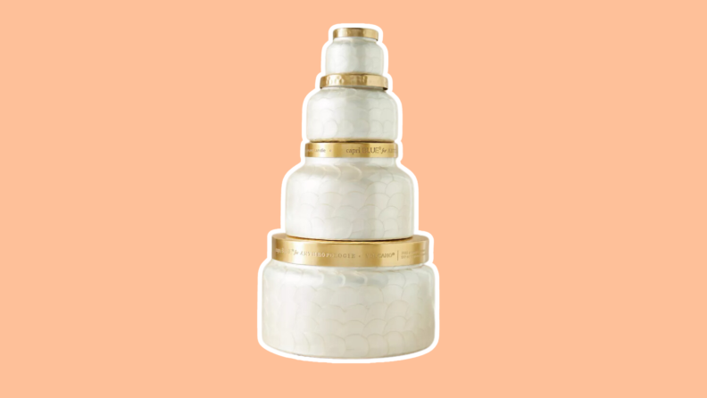 Capri Blue Candles in four assorted sizes are stacked on top of each other, from extra small to extra large.