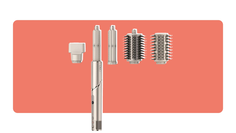 A rose gold FlexStyle Air Styling & Drying tool surrounded by four other attachment pieces.