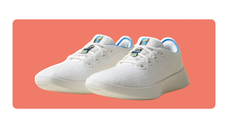 A pair of white Allbirds Women's Wool Runner 2 sneakers in Natural White/NZ Blue colors.
