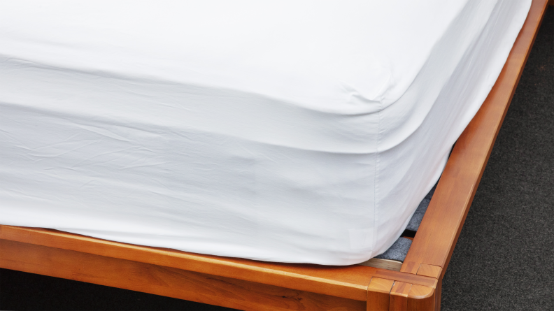 A set of Brooklinen sheets is shown on a bed during testing for the best bed sheets.