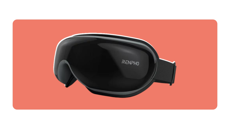 A black Renpho eye massager turned slightly on an angle.