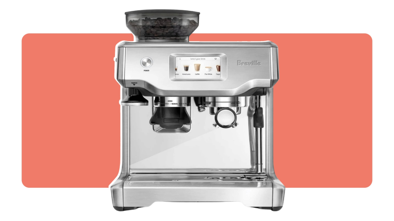 A Breville Barista Touch coffee machine in stainless steel finish.