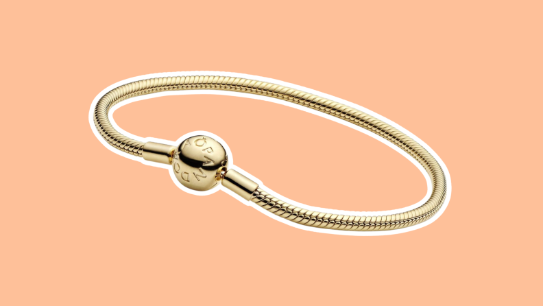 Product shot of a yellow gold Pandora Moments snake chain bracelet with no charms.