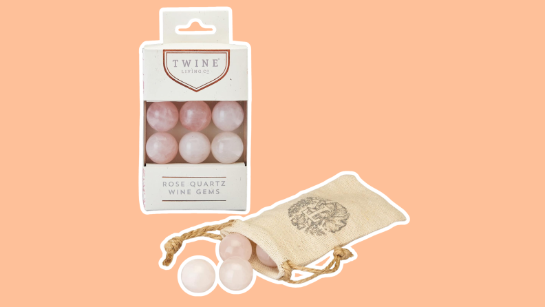 A package of Twine Rose Quartz Wine Gems featuring six gems and a bag to store them.
